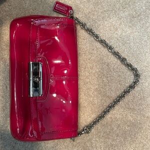 Coach clutch, never used.